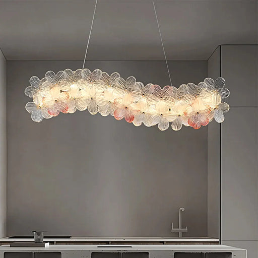 elegant-floral-glass-linear-chandelier-over-a-kitchen-island-ch449-20250806-Feyran-lighting
