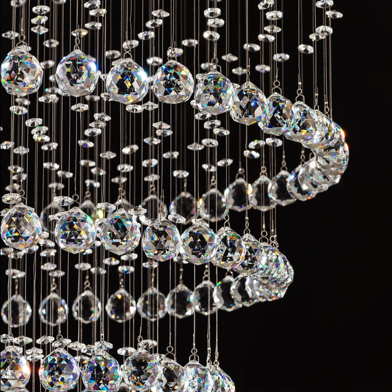 close up detail of faceted crystal balls used in luxury modern round crystal chandelier lighting fixture | Feyran