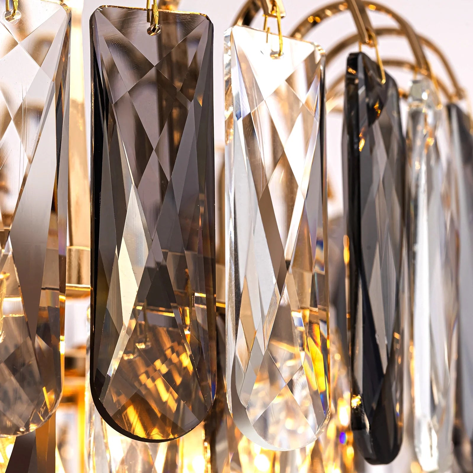 close-up-of-luxury-gold-crystal-tiered-chandelier-Feyran-lighting