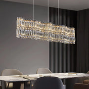 luxury-wave-crystal-linear-chandelier-installed-in-dining-room-ch406-20250619-Feyran-lighting