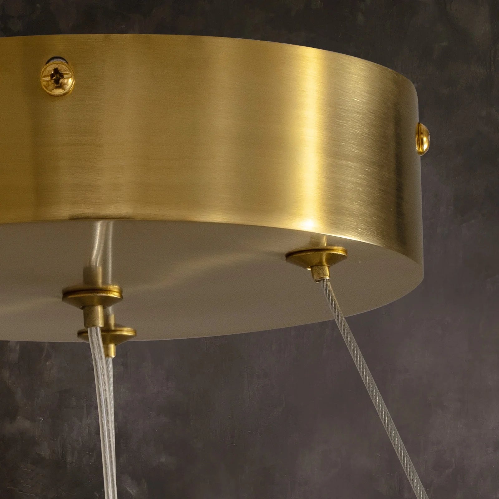 close-up-of-modern-round-alabaster-gold-chandelier-with-circular-gold-frame-and-evenly-spaced-alabaster-panels-emitting-warm-light-Feyran-lighting