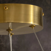 close-up-of-modern-round-alabaster-gold-chandelier-with-circular-gold-frame-and-evenly-spaced-alabaster-panels-emitting-warm-light-Feyran-lighting