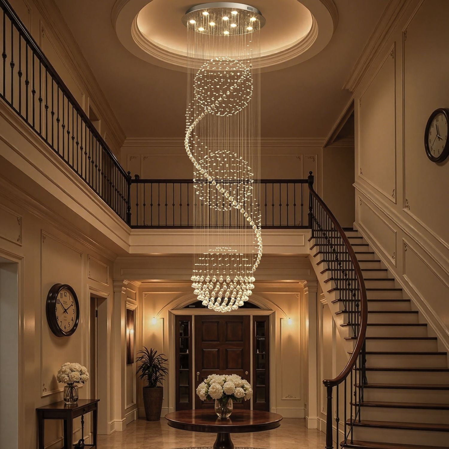 Modern spiral three sphere raindrop crystal chandelier lighting in elegant foyer with staircase | Feyran