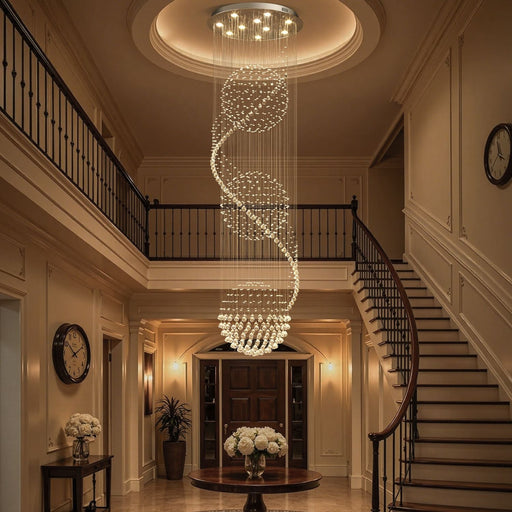 Modern spiral three sphere raindrop crystal chandelier lighting in elegant foyer with staircase | Feyran